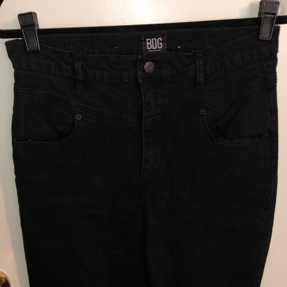 BDG twig high rise jeans in black with knee rips